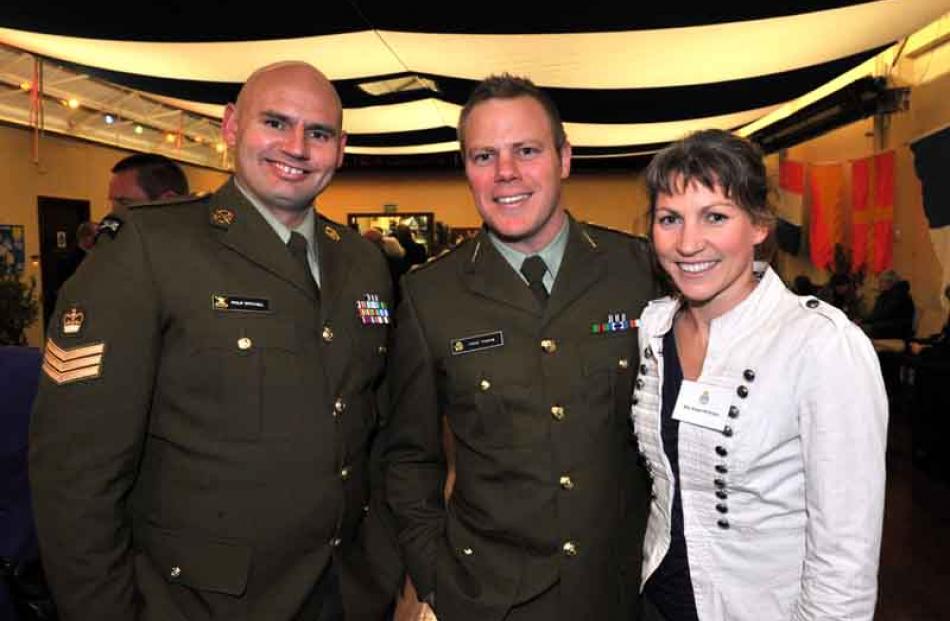 2/4 RNZIR training warrant officer Philip Witchall, NZ Army Captain Craig Thorne, and Angela...