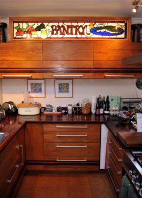 Kevin Hayward's son, Tom, used rimu, kauri and jarrah in the kitchen. The ''PANTRY'' sign was...