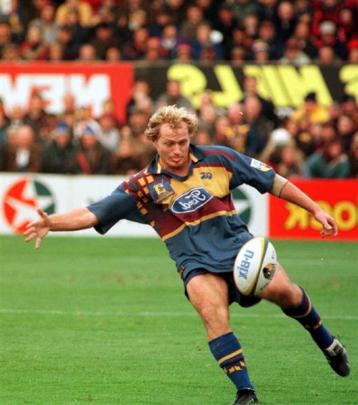 Highlanders first five-eighth Tony Brown makes a clearing kick during the 1999 final, promoted as...