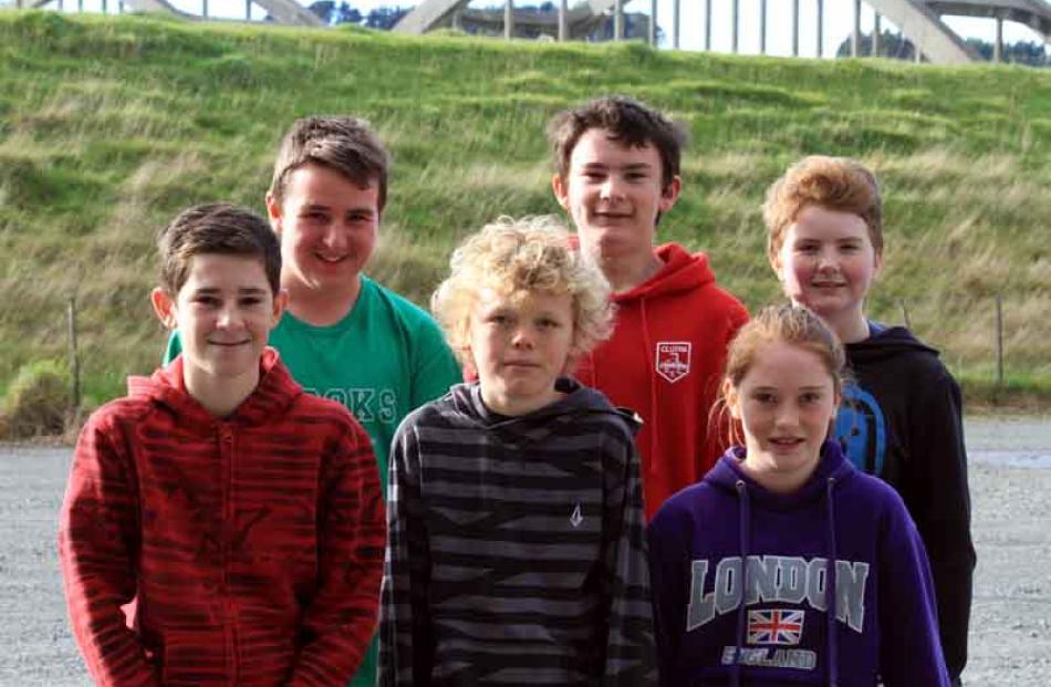 Blake Mosley (12), front left, James Pettitt (12), Amy Smith (12), Caleb McKay (12), back left,...