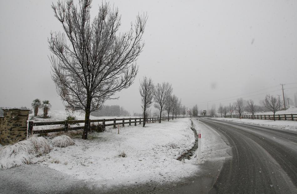 Snow at the entrance to Shotover Country estate. Photo by Blair Pattinson