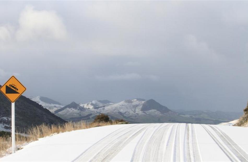 The Owaka Valley Rd covered in snow yesterday. Photo by Hamish MacLean.