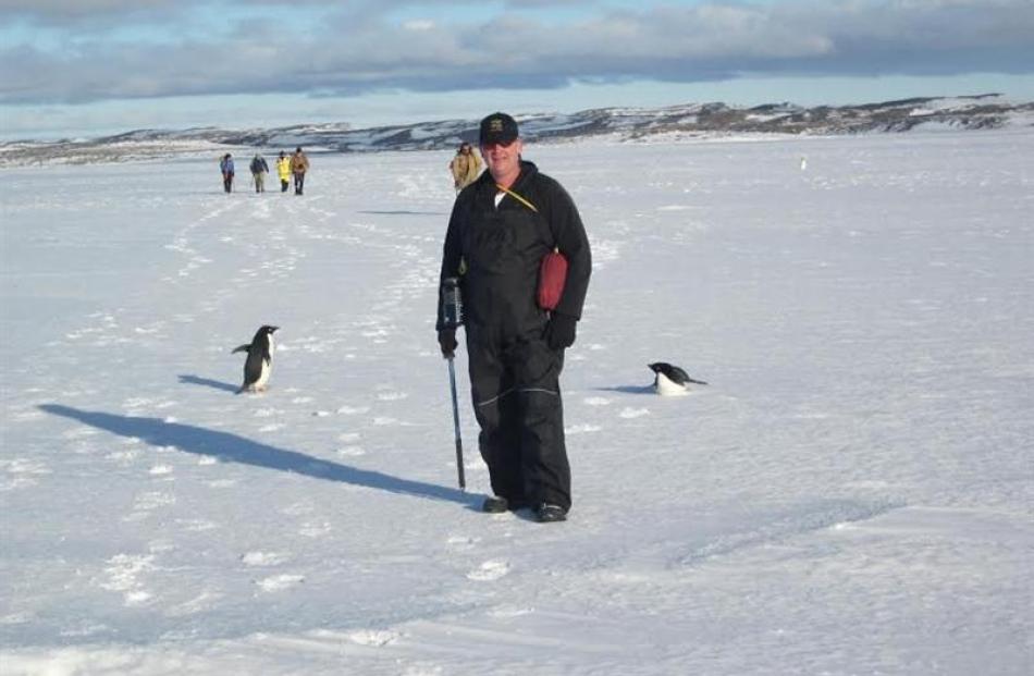 Mr Oakes takes an evening stroll in  the Antarctic.
