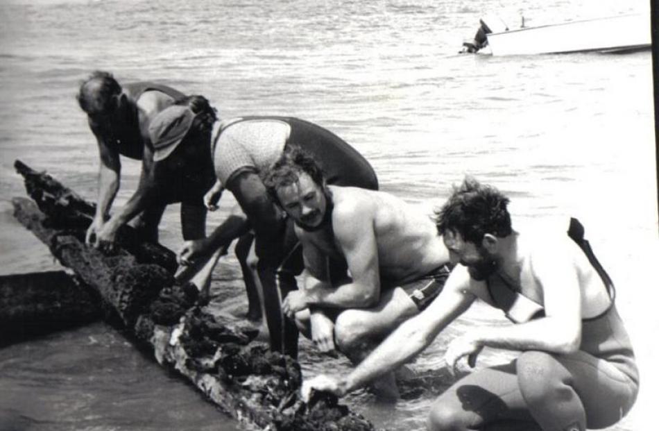 Maritime museum founder Noel Hilliam (second from left) and his dive team photographed in 1983...