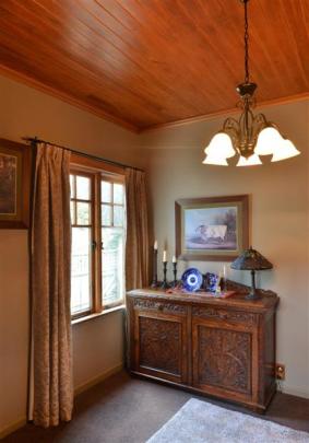 The former dining room has a rimu ceiling.
...