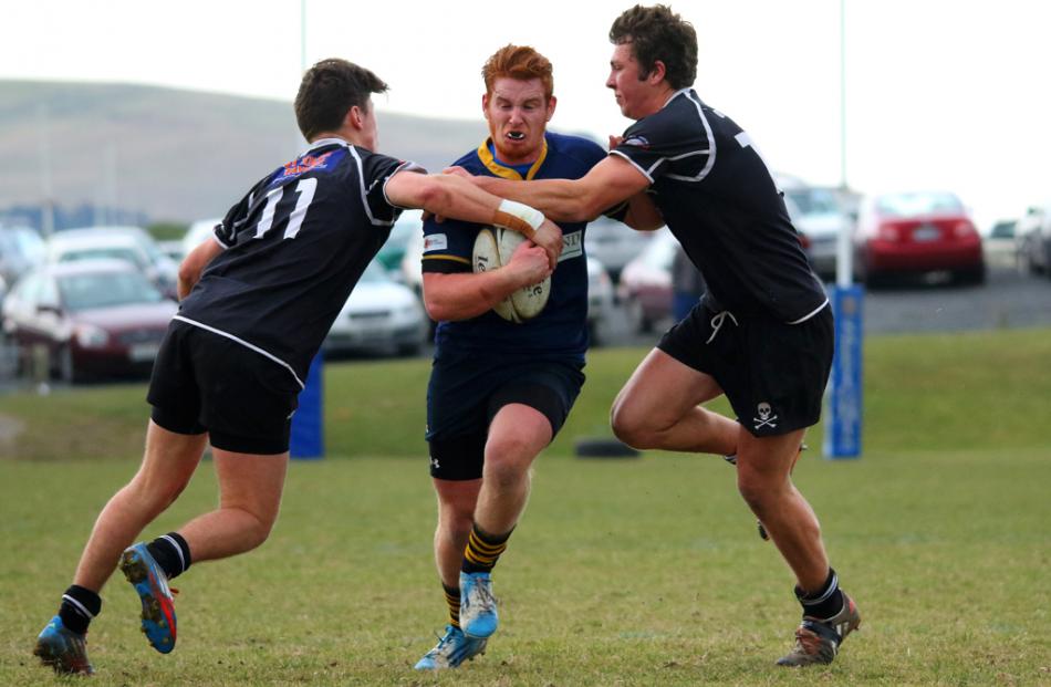 Dunedin wing Liam Ward attacks the Pirates defense during an attacking movement. Photo by Caswell...