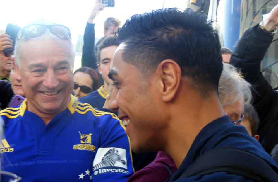 Big smiles from fans for Malakai Fekitoa.