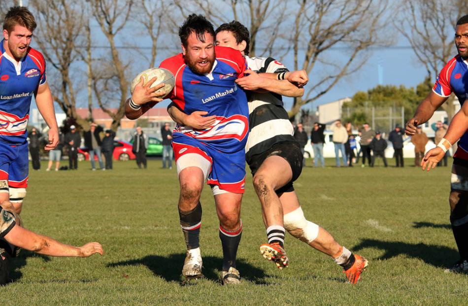 Harbour prop Peter Mirrielees makes a strong run towards the Southern try-line while halfback...