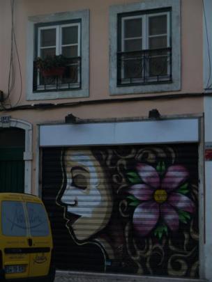 Lisbon's graffiti makes a colourful backdrop in a residential neighbourhood.