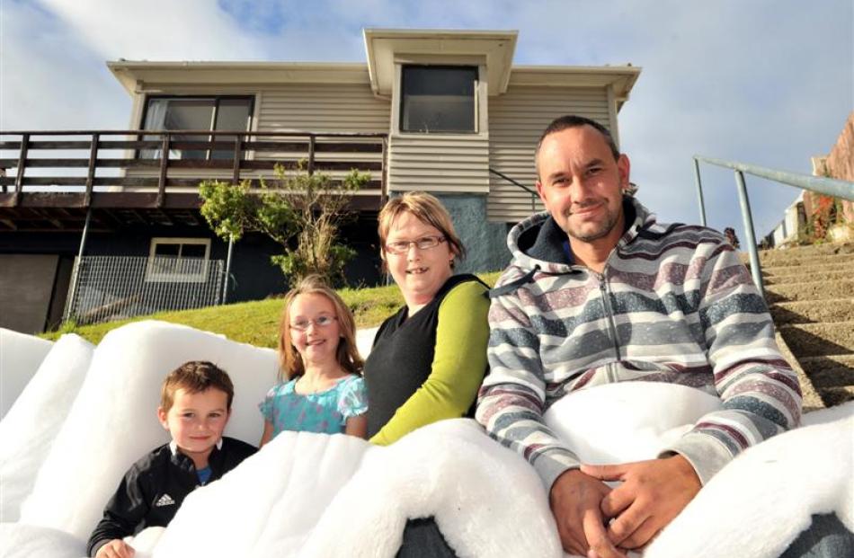 The Petrie family, (from left) Keiran (5), Caitlyn (8), Alison and Tony Petrie, photographed in...