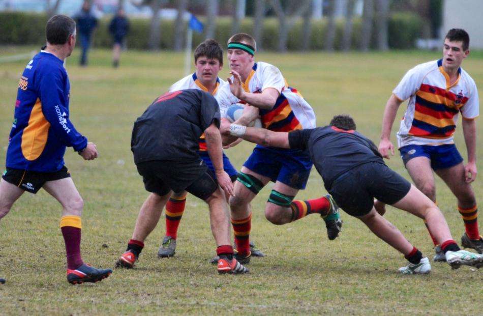 Action from the match between John McGlashan College and Waitaki Boys' High School. Photo by...