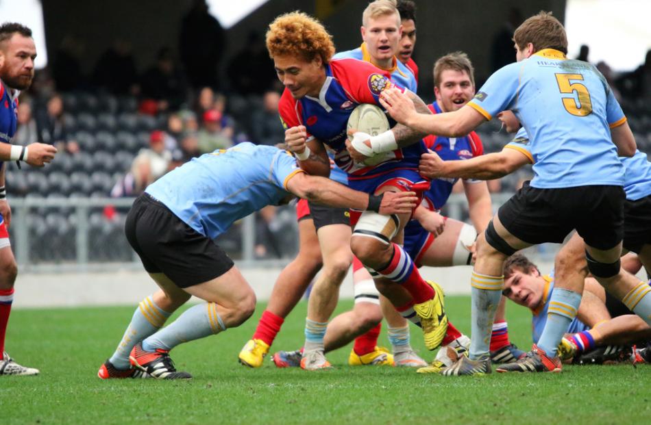 Action from the semifinal between University A and Harbour. Photo by Caswell Images.