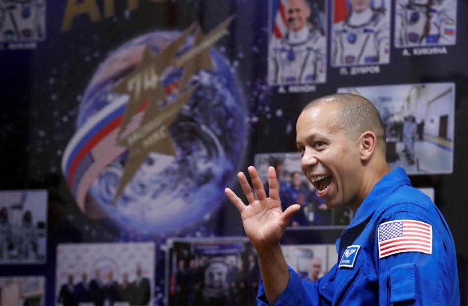 Nasa astronaut Chris Williams waves during a press conference ahead of an expedition to the...