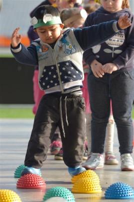 Wakari School pupil Sanjok Khattri (5) keeps his balance.