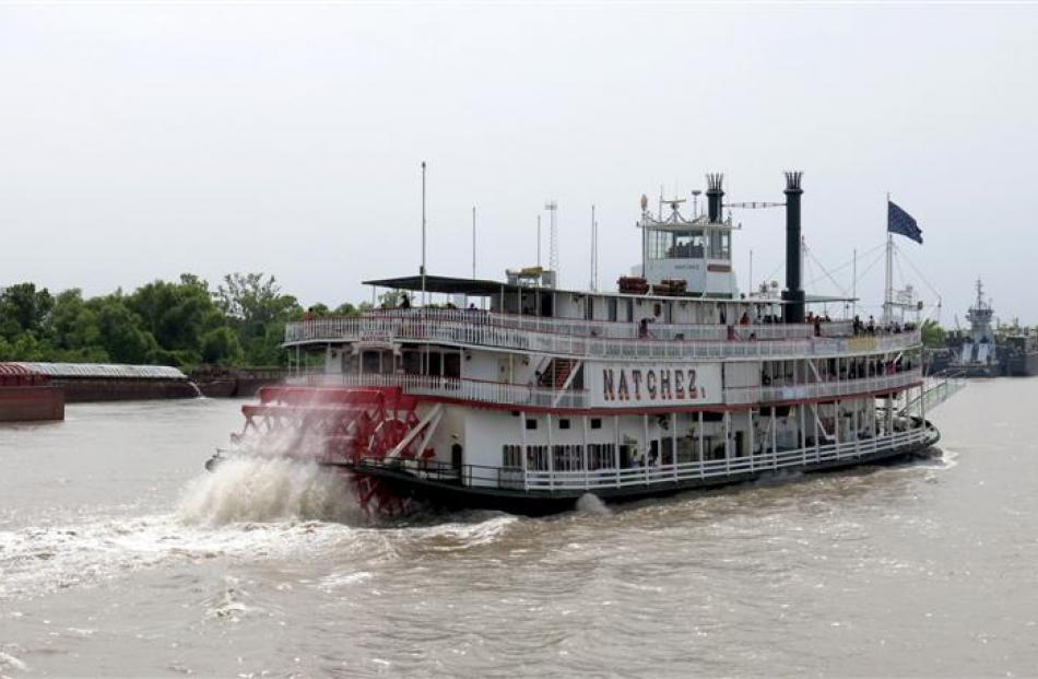 A paddle-wheel steamboat on the Mississippi.