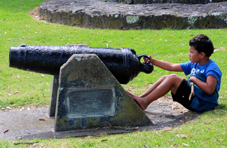 A new generation of Ngati Whakaue takes aim toward Te Tumu with the cannon named Te Haupapa, the...