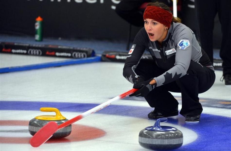 Thomas' team mate Kalynn Park issues instructions during the Winter Games NZ mixed doubles...