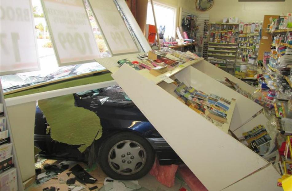 The damage to the shop's interior.