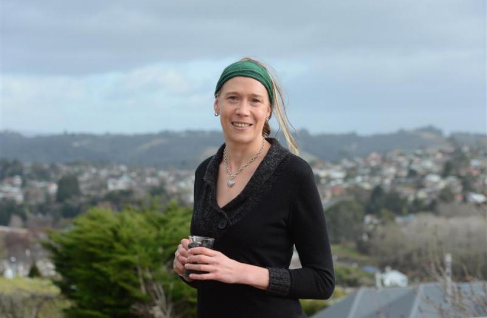 Casey Coombes (34) at her Green Island home. Photo by Linda Robertson.
