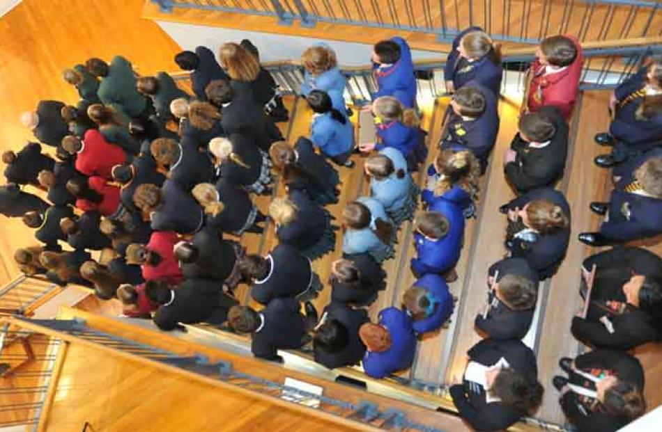 The assembled Class Act 2015 recipients viewed from the upper gallery as they pose for a photo...