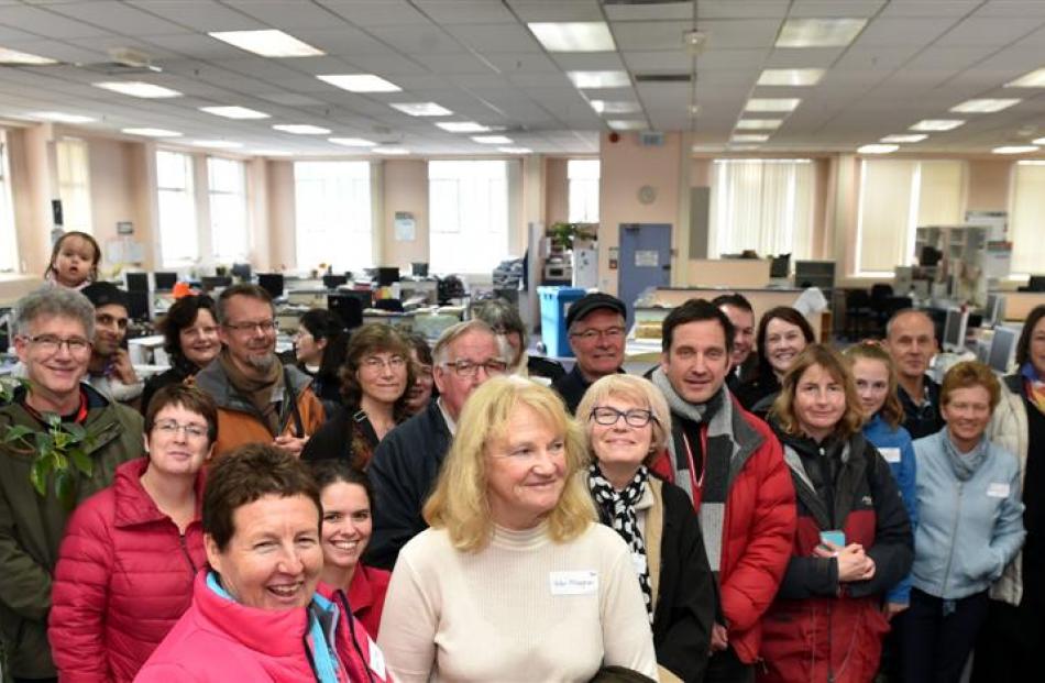 Festival participants take a tour of the editorial floor of the Otago Daily Times building on...