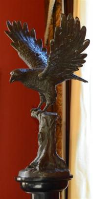 The eagle on a plinth was bought by Margaret Barker at an antiques shop in Napier. Photos by...