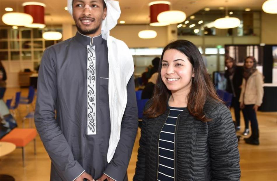 Muslim students Moy Barnawhi (23, left), originally of Saudi Arabia, and Mena Alsaffar (22),...