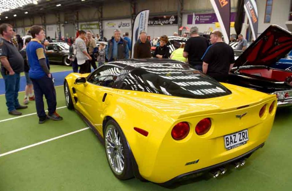 A Chevrolet ZR1 Corvette attracts a bit of interest.