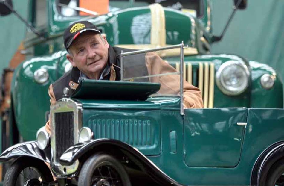 Charlie Boyes, of Dunedin, displays his 1942 Ford Jailbar, and a miniature Austin 7 built by his...