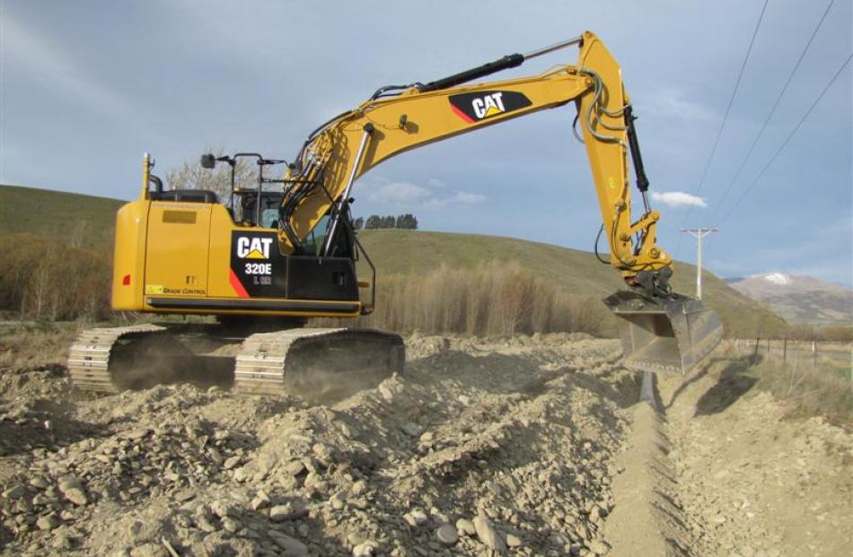 Pipes were being installed this week to carry water from a bore field near the Clutha River to...
