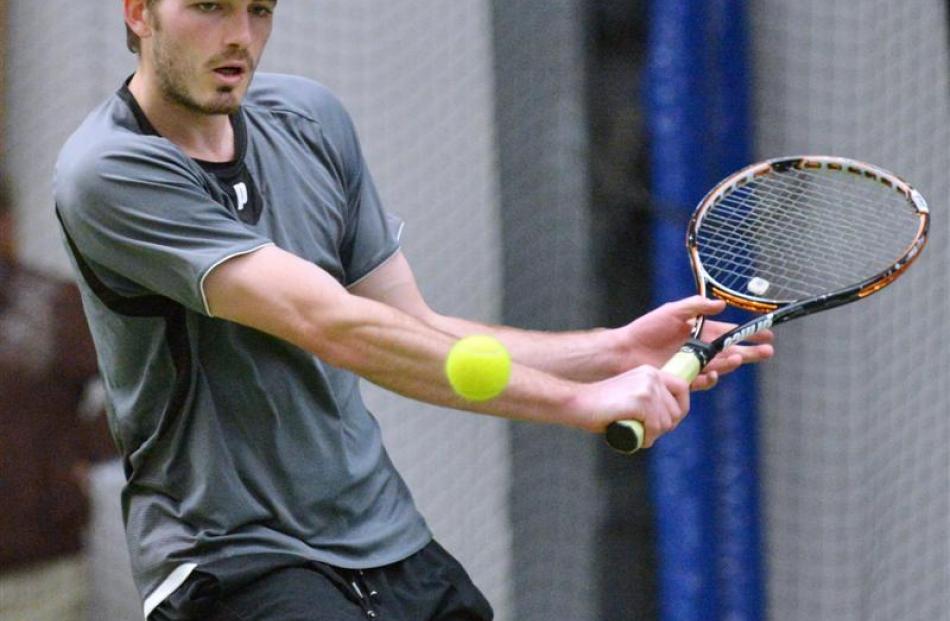 Aaron Hicks returns a shot during play in the final of the Otago Tennis Open  at the Edgar Centre...