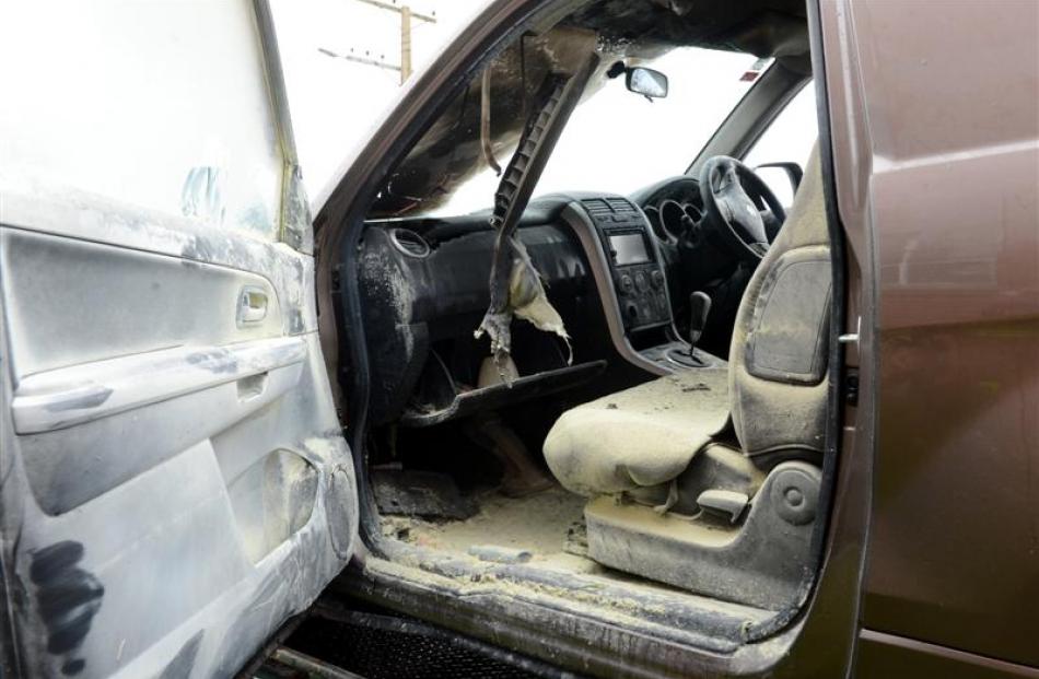 The fire-damaged interior of the vehicle.