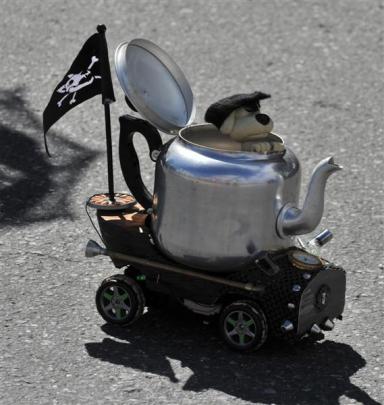 Remote-controlled racing steampunk teapots entertained the crowds watching the parade. Photo by...