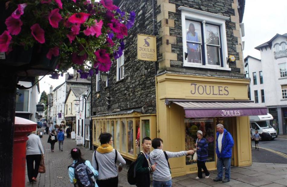 Lake District visitors take in the sights of the cosy Cumbrian market town of Keswick.