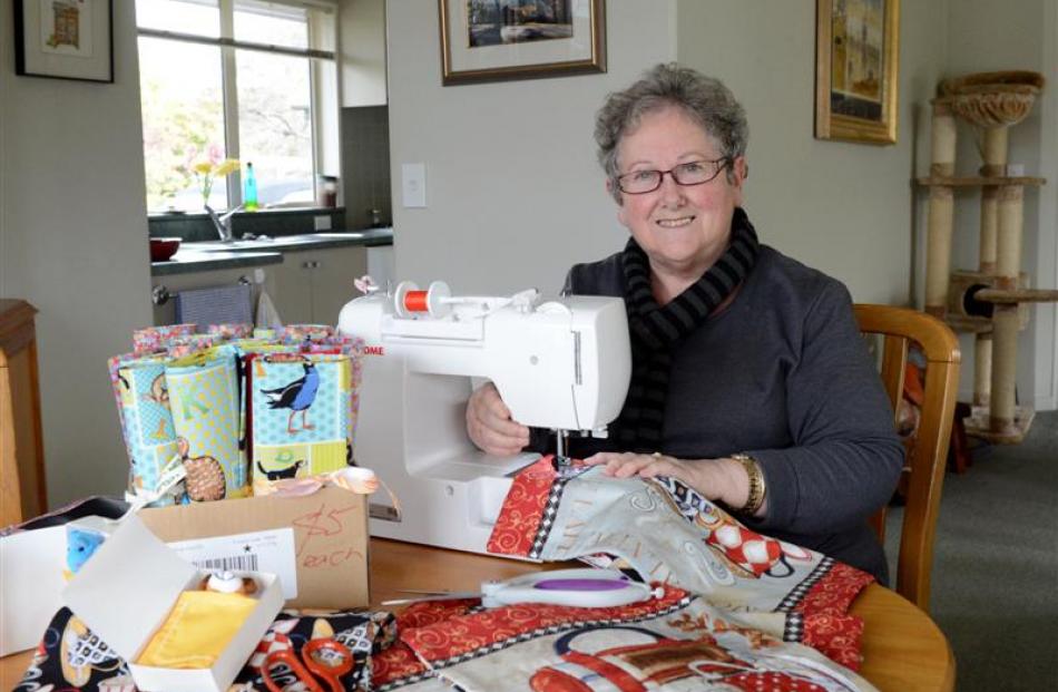 Mosgiel Inner Wheel member Carol  McRobie-Shaw hard at work on some hand crafts. Photo by Linda...