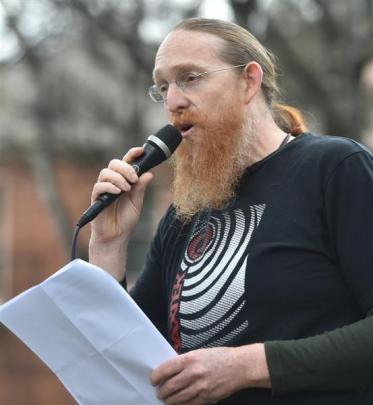 Student advocate Mark Baxter addresses the protesters.