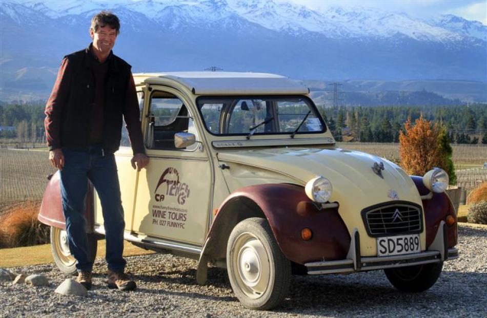 Deane Weastell, of Funny French Cars, with a Citroen 2CV used for touring the district.