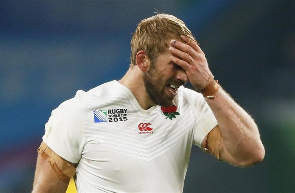 The face of despair ... Chris Robshaw is devastated after England exit their own World Cup in the...