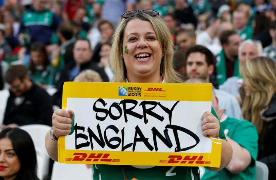 An Irish fan appears happy that England were knocked out in the pool stages. Photo: Reuters