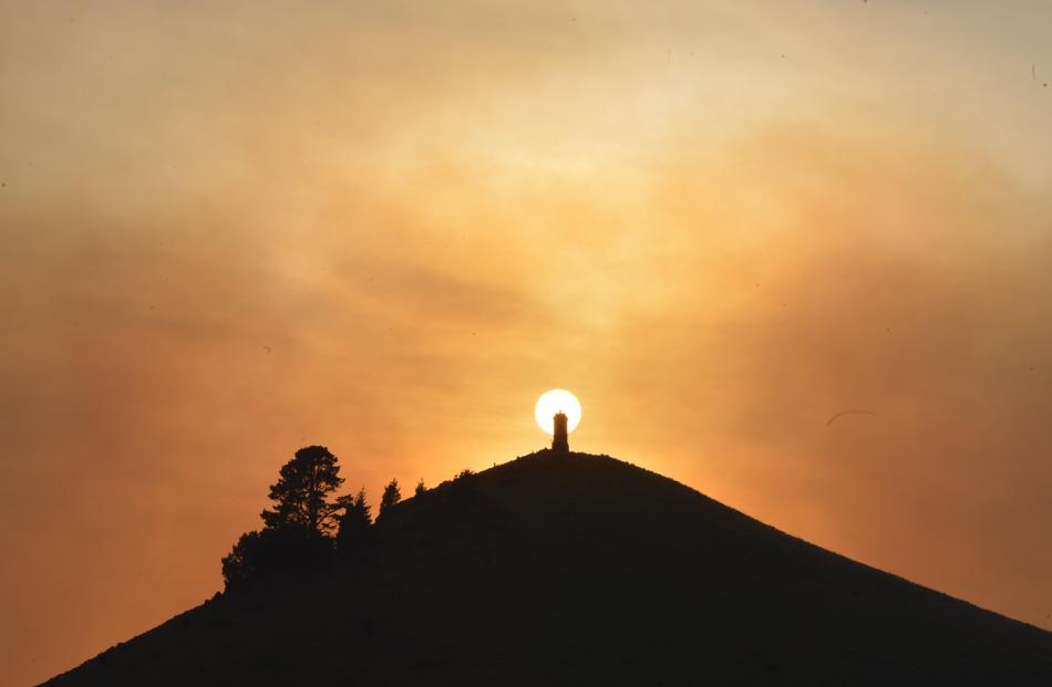 Smoke from a plantation fire near Dunback hangs in the sky. Photo by Stephen Jaquiery.
