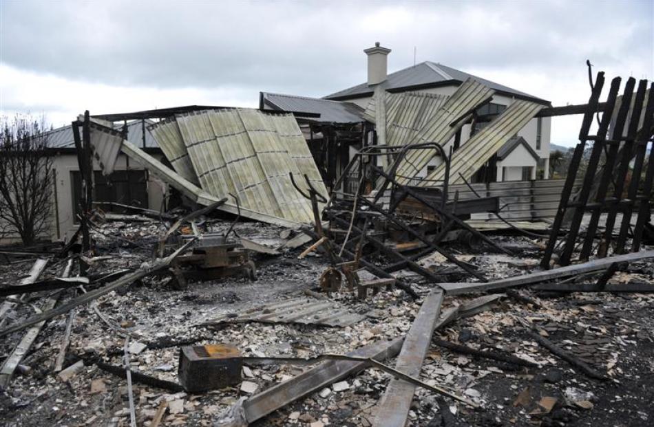 The damaged Coalstage Rd property yesterday.