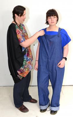 Designer Fiona Clements works on a piece for her label Senorita AweSUMO with model Jess Blyth.