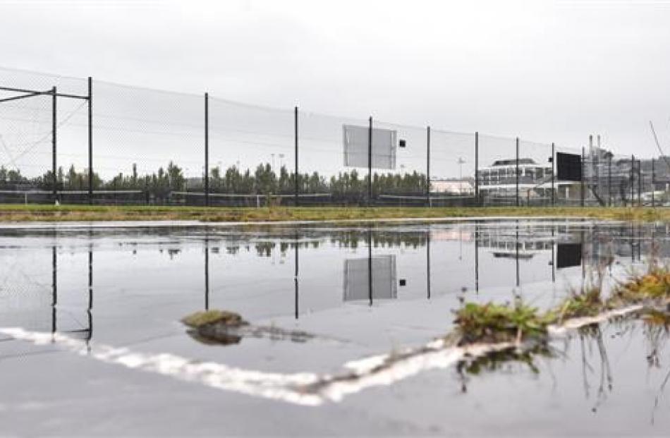 Tennis courts sit empty at Logan Park earlier this week. Photo by Peter McIntosh.