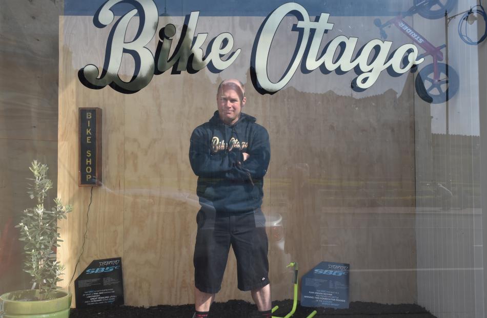 Jeremy Forlong, a bicycle mechanic at the premises of Bike Otago, Dunedin, contemplates the...