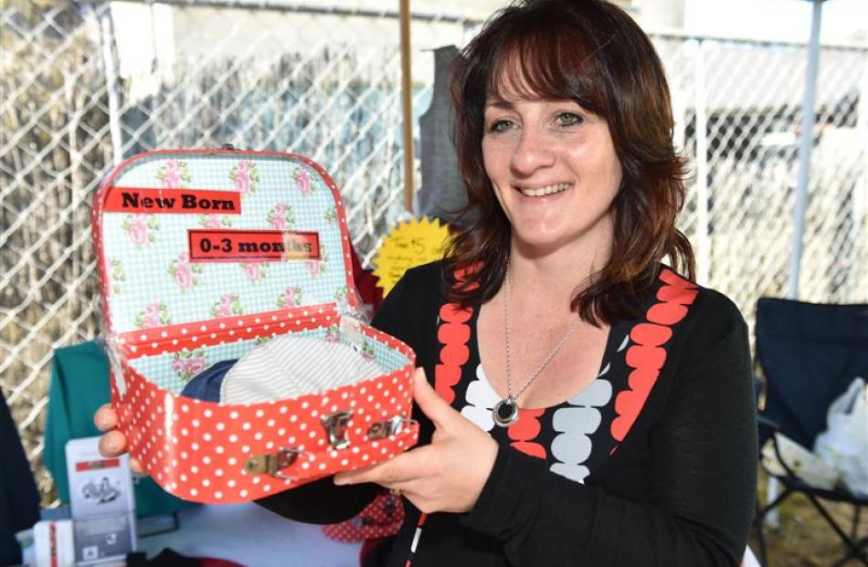 Cherubz Merino owner Sally Smith, of Mosgiel, displays her handmade merino baby hats in an...