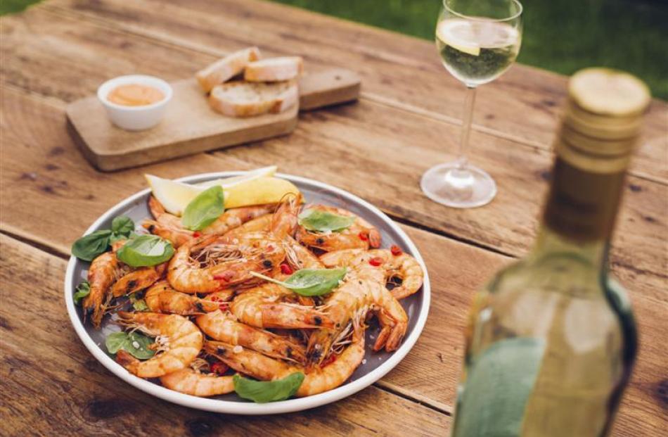 Barbecued prawns and white wine.