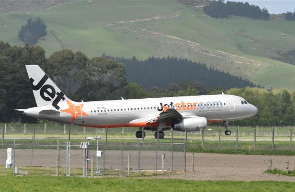 A Jetstar Airbus A320 leaves Dunedin Airport for Wellington, a  service the airline has introduced.