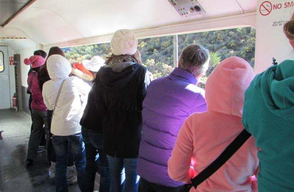 The viewing carriage is open to the air and a popular place for photographs.