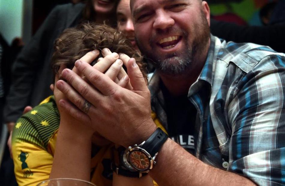 Josh Foster, from Victoria, holds his head in disbelief as a good natured Patrick Morrison, from...