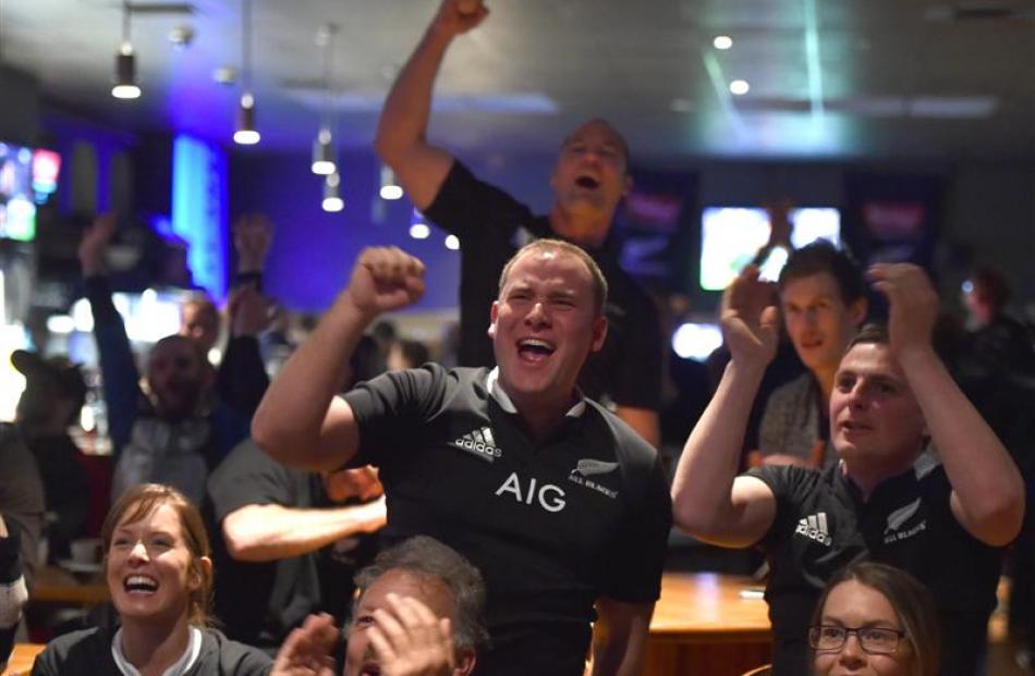 Marty Boyd (left) and Spencer Bremner, of Dunedin, cheer on the All Blacks at The Terrace.